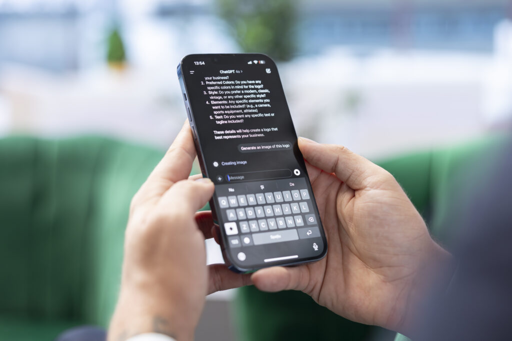 Bucharest, Romania - July 30th 2024 - Boss uses the AI virtual assistant via mobile phone app, using artificial intelligence to provide real time solutions. Efficient data analysis bot.